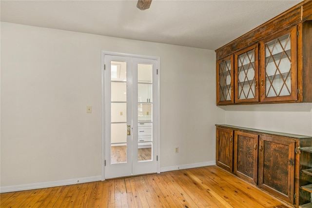 19402 E 5th St, Umatilla, FL 32784 - empty room with light wood finished floors and baseboards
