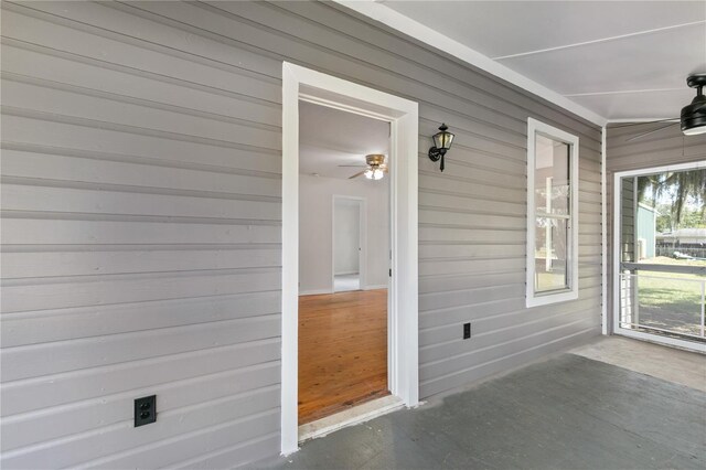19402 E 5th St, Umatilla, FL 32784 - unfurnished sunroom featuring ceiling fan