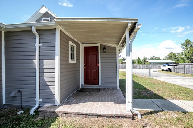 19402 E 5th St, Umatilla, FL 32784 - doorway to property with fence