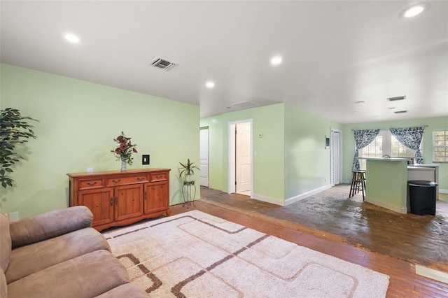 living room featuring dark hardwood / wood-style floors