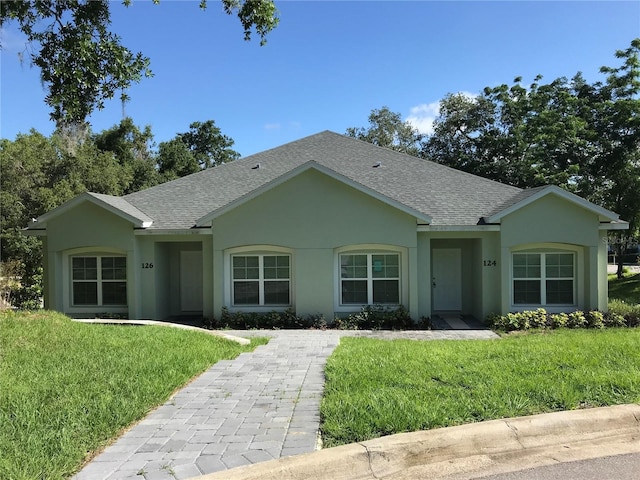 ranch-style house with a front yard