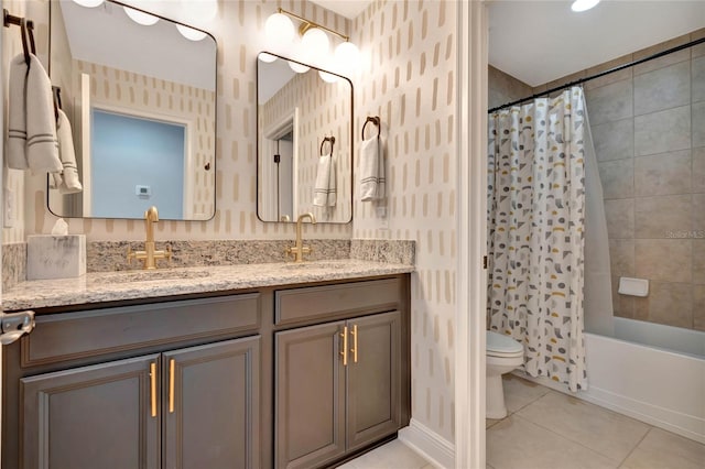 full bathroom featuring tile patterned floors, shower / bath combination with curtain, toilet, and vanity