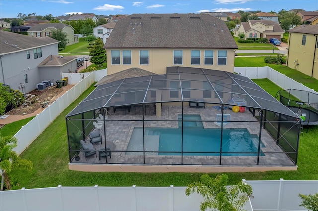 back of house with a patio, a fenced backyard, and a residential view