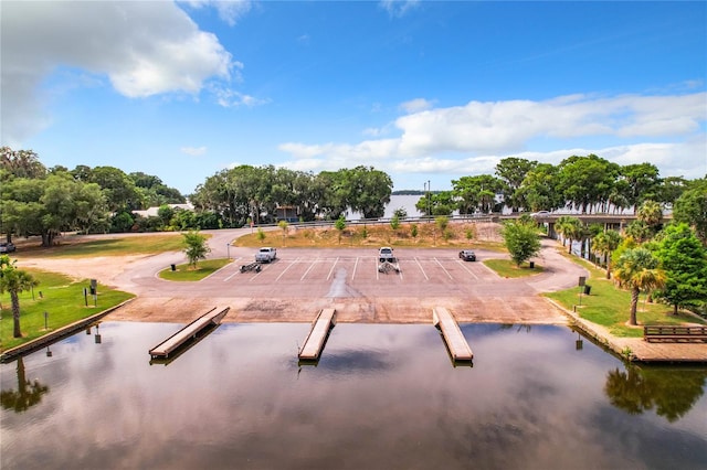 view of community with a water view