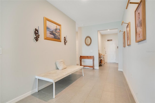 hallway featuring light tile patterned floors