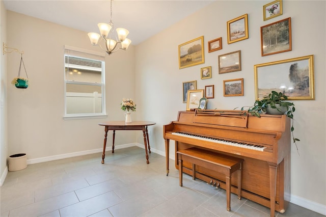 miscellaneous room featuring a notable chandelier and light tile patterned floors