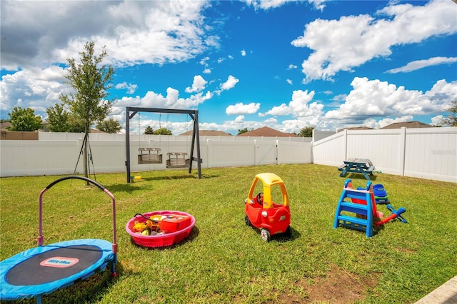 view of jungle gym with a yard