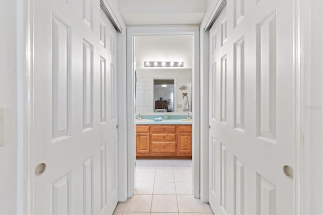 bathroom with vanity and tile patterned flooring