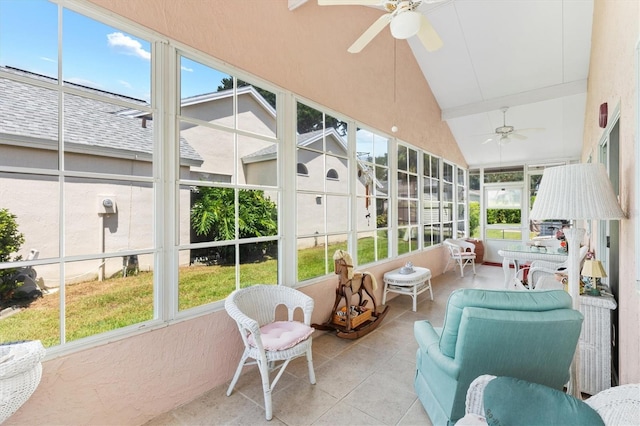 sunroom / solarium with ceiling fan and lofted ceiling