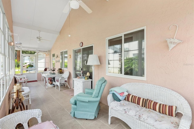 sunroom / solarium with vaulted ceiling and ceiling fan