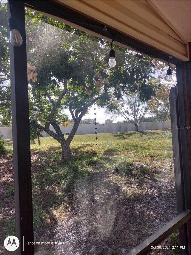 view of yard with a rural view