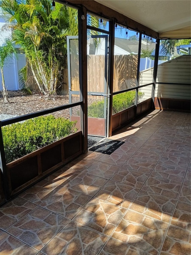 view of unfurnished sunroom