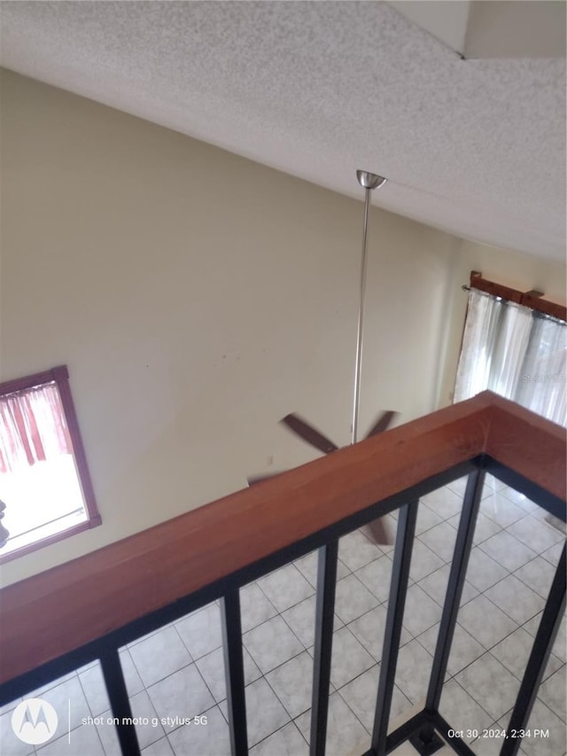 interior space with a textured ceiling