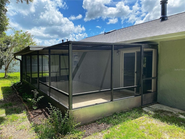 exterior space featuring a sunroom