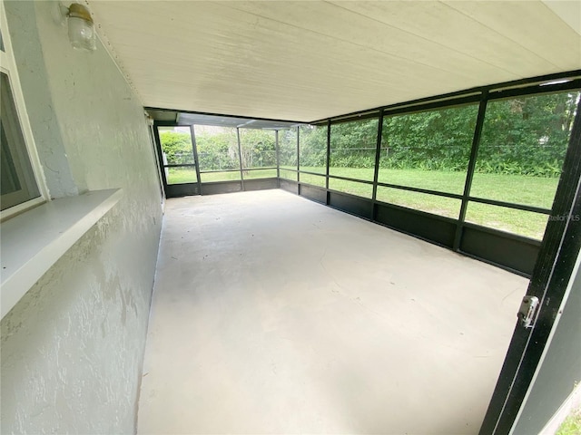 unfurnished sunroom featuring a healthy amount of sunlight