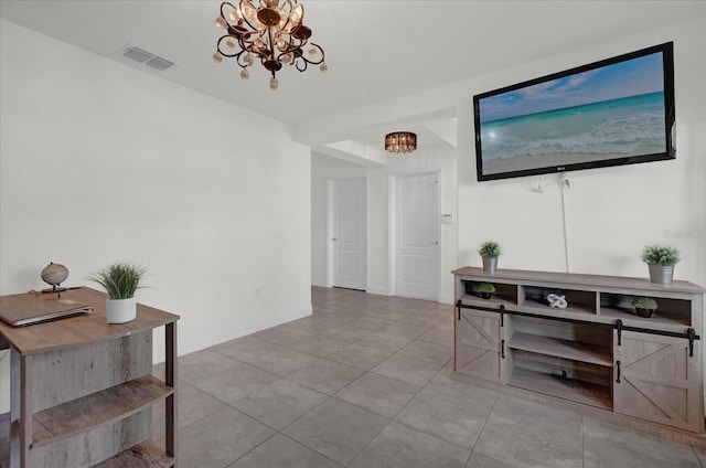 hallway featuring a notable chandelier and light tile patterned floors