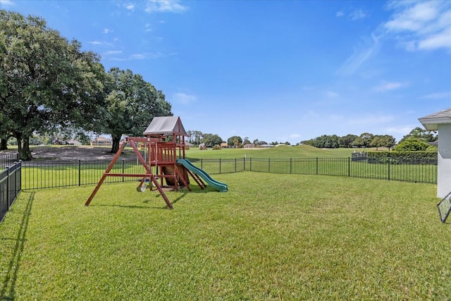 view of playground featuring a yard