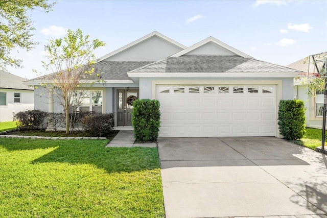 single story home with a front yard and a garage