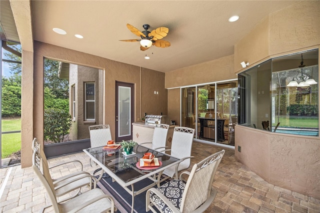 view of patio / terrace featuring a grill and ceiling fan