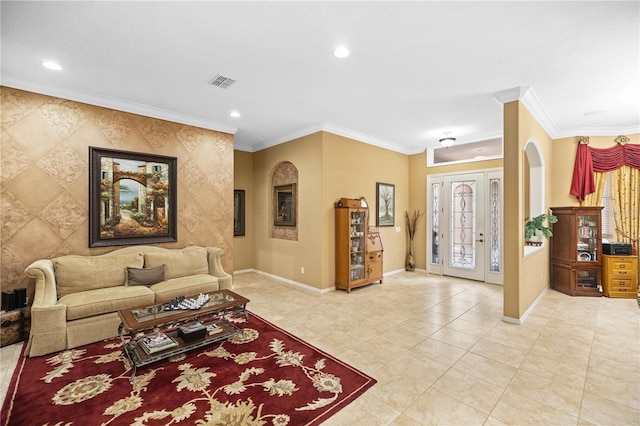 living room with ornamental molding and light tile patterned floors