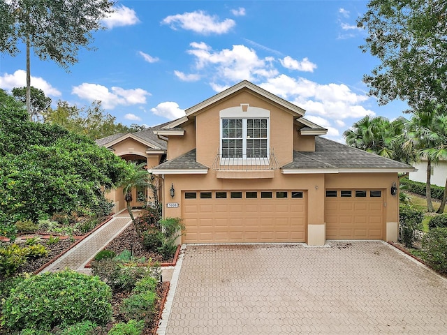 front of property with a garage