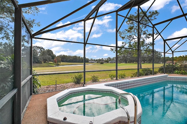 view of swimming pool with glass enclosure and a lawn