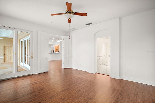 empty room featuring hardwood / wood-style floors