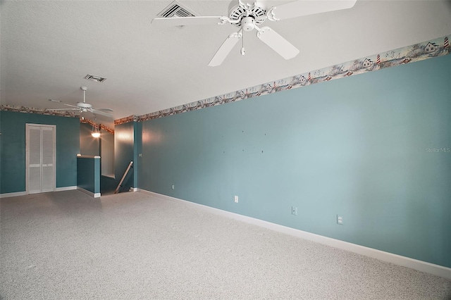 unfurnished room featuring ceiling fan