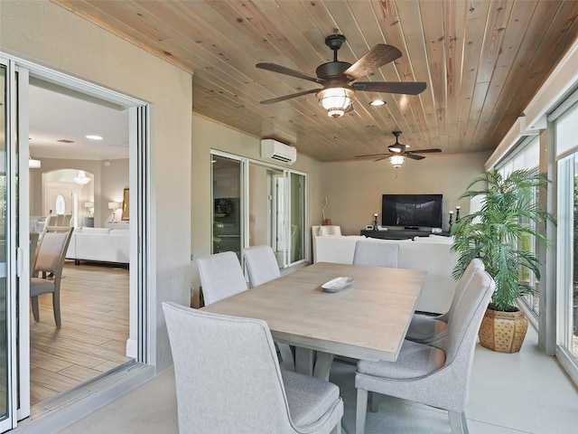 exterior space with wood ceiling, ceiling fan, arched walkways, recessed lighting, and a wall mounted AC