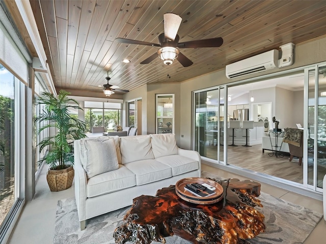 sunroom featuring a wall mounted air conditioner and wood ceiling