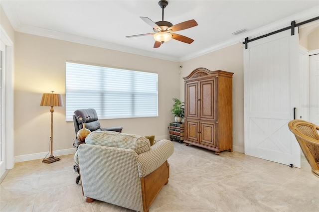 living area with ornamental molding, ceiling fan, a barn door, and visible vents