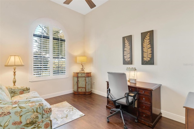 office area featuring baseboards, a ceiling fan, and wood finished floors