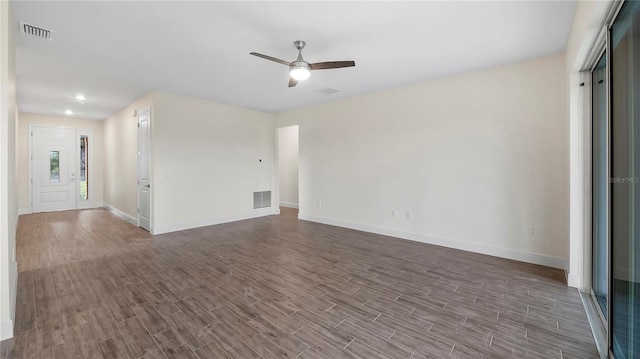 unfurnished living room featuring hardwood / wood-style floors and ceiling fan