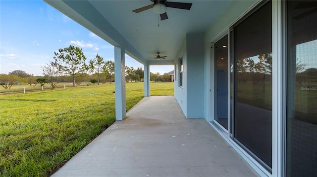 view of patio with ceiling fan