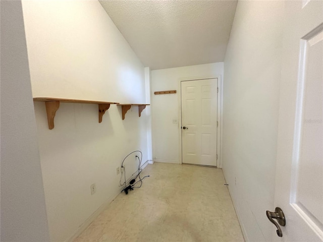 interior space with a textured ceiling