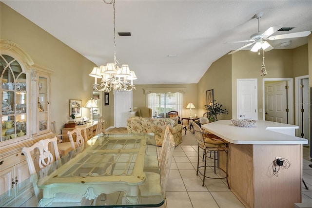 1213 El Esparza Ln, The Villages, FL 32159 - dining area featuring vaulted ceiling, ceiling fan, light tile patterned flooring, and a chandelier