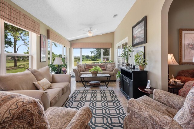 sunroom with vaulted ceiling and ceiling fan