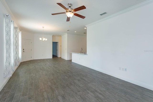 empty room with ceiling fan with notable chandelier, sink, dark hardwood / wood-style flooring, and crown molding