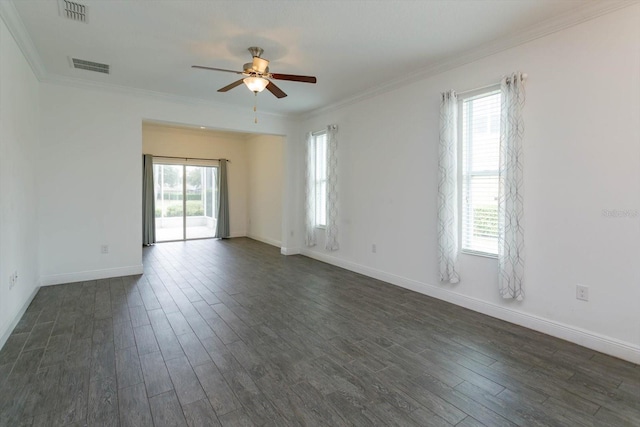 empty room featuring ceiling fan, dark hardwood / wood-style floors, and ornamental molding