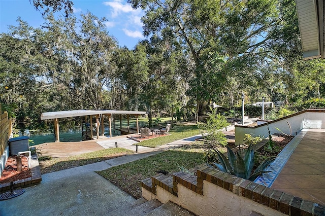 surrounding community featuring a water view