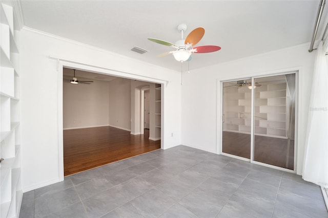 unfurnished bedroom featuring a closet, hardwood / wood-style flooring, crown molding, and ceiling fan