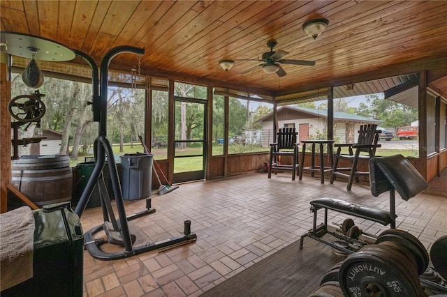 sunroom / solarium with ceiling fan