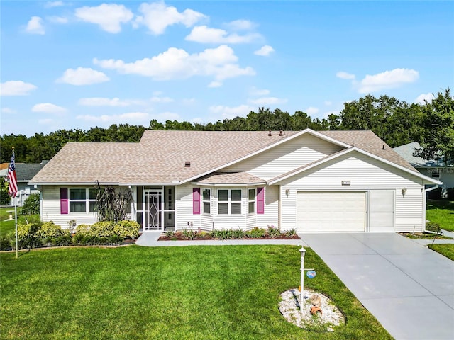 single story home with a garage and a front yard