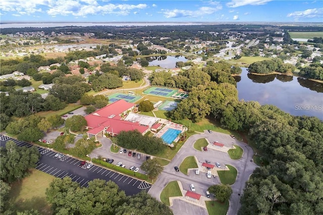 bird's eye view with a water view