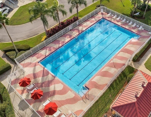 view of swimming pool with a patio