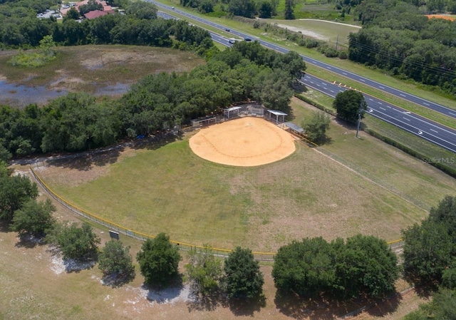 birds eye view of property with a rural view