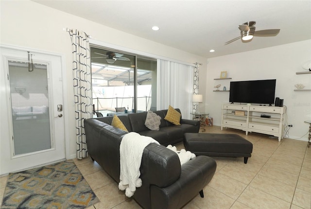 tiled living room featuring ceiling fan