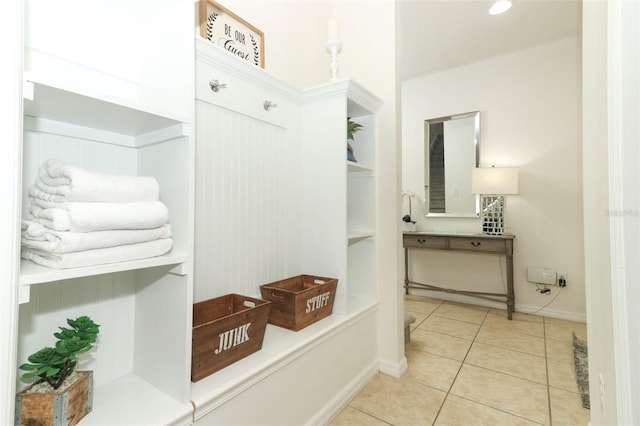 mudroom with light tile patterned floors