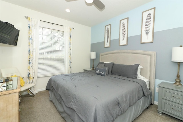 carpeted bedroom featuring ceiling fan