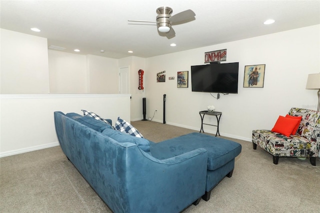 living room featuring ceiling fan and carpet floors